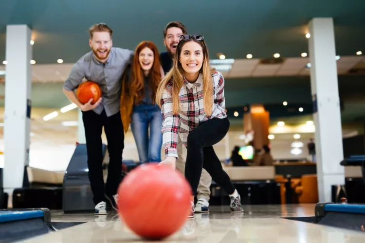 How do you get consistent strikes in bowling?